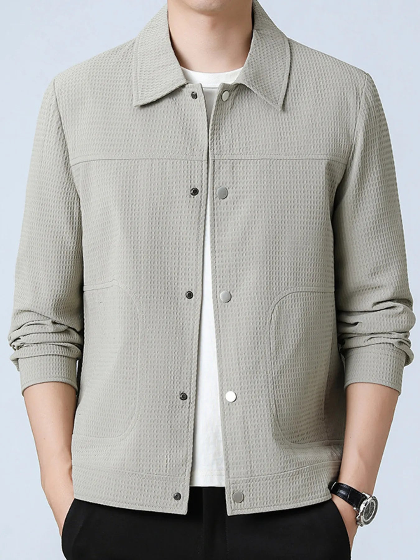 Men’s light gray button-up long sleeve jacket with side pockets, worn over a white t-shirt