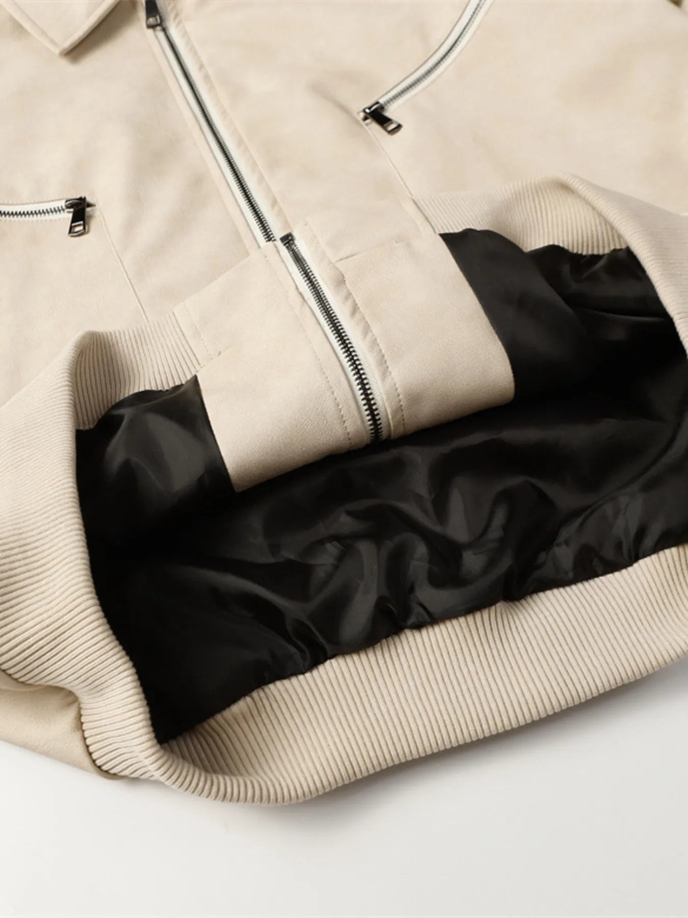 The mens-zip-up-long-sleeve-jacket-4 is a sleek, lightweight zip-up jacket featuring long sleeves, a comfortable fit, and versatile styling suitable for casual and outdoor wear.
