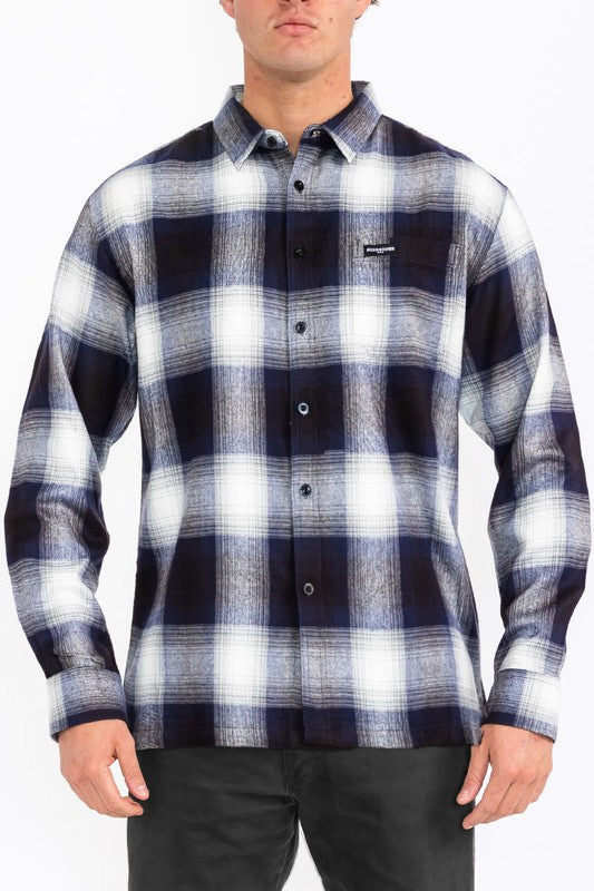 This men's plaid long-sleeve flannel shirt combines classic patterning with soft, breathable fabric for timeless comfort and versatile, everyday style.