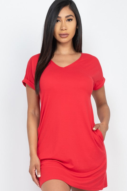 Woman wearing a red dress against a white background