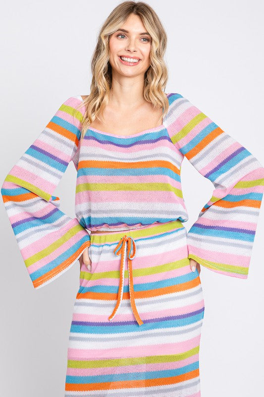 A vibrant stripe design and cropped shape give this top a fresh, youthful vibe.