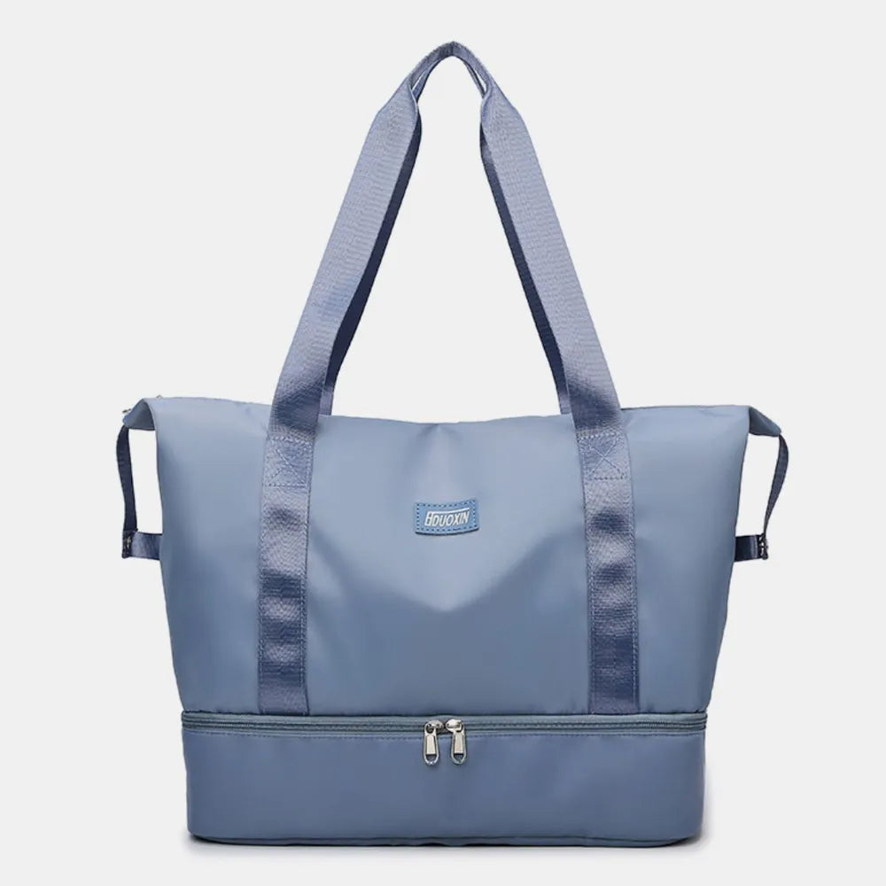 Lavender tote bag with pink straps and a zippered bottom compartment. Sleek and functional—great for gym, travel, or daily use.