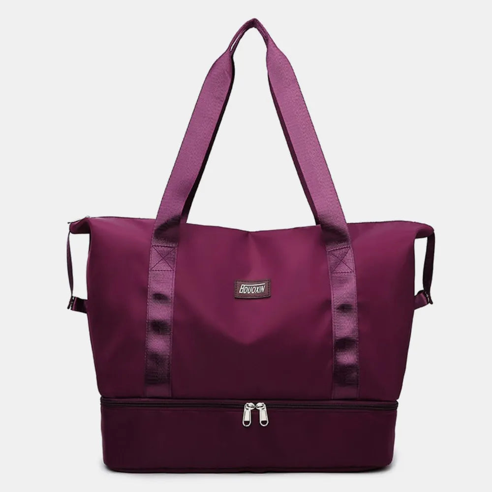 Deep purple tote bag with pink straps and a zippered bottom compartment, Sleek and functional—great for gym, travel, or daily use.