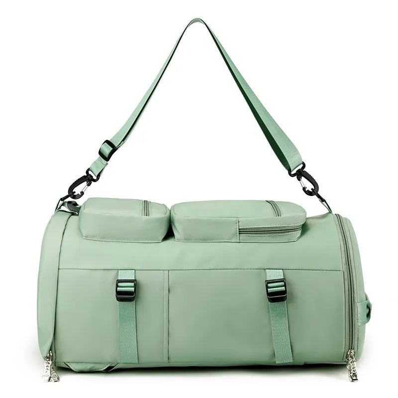 A large mint green backpack with multiple zippered compartments and side straps. Functional and stylish—great for travel or outdoor use.