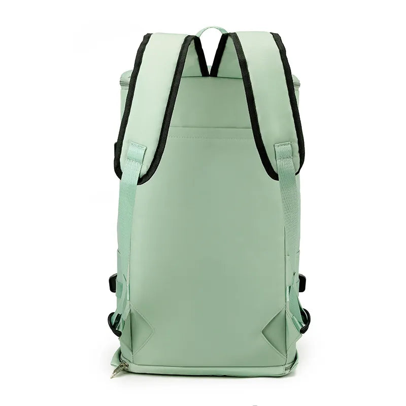 A large mint green backpack with multiple zippered compartments and side straps. Functional and stylish—great for travel or outdoor use.