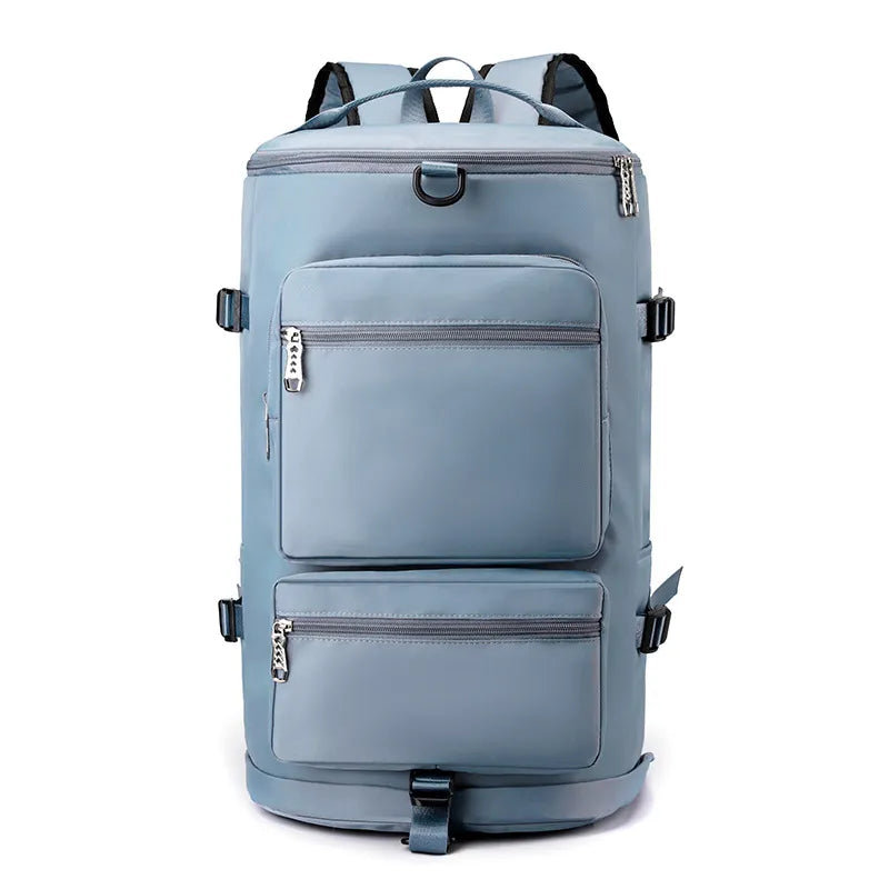Light blue backpack with multiple silver-zippered compartments, padded straps, and side buckles. Sleek and functional—perfect for travel or daily use.