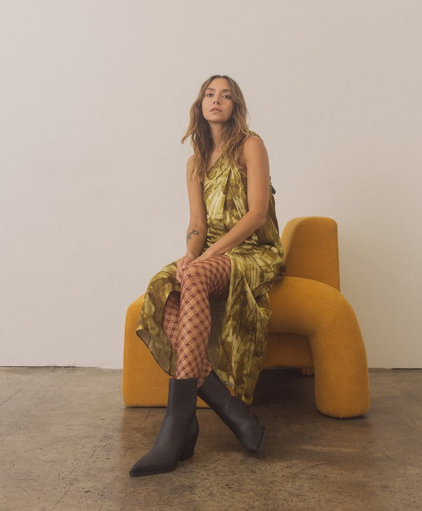 Leather ankle boots with square toe, stacked wooden block heel, side zipper closure, and slip-on style