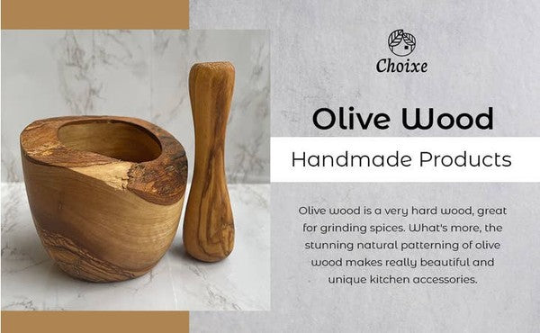 The olive wood rustic mortar and pestle-1 is a sturdy, natural-toned kitchen tool crafted from olive wood, showcasing unique grain patterns and a compact, traditional design for grinding herbs and spices.