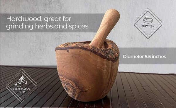 The olive wood rustic mortar and pestle-1 is a sturdy, natural-toned kitchen tool crafted from olive wood, showcasing unique grain patterns and a compact, traditional design for grinding herbs and spices.