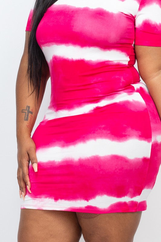 Woman wearing a stripe tie-dye midi dress with short sleeves and lace detail, styled against a white background