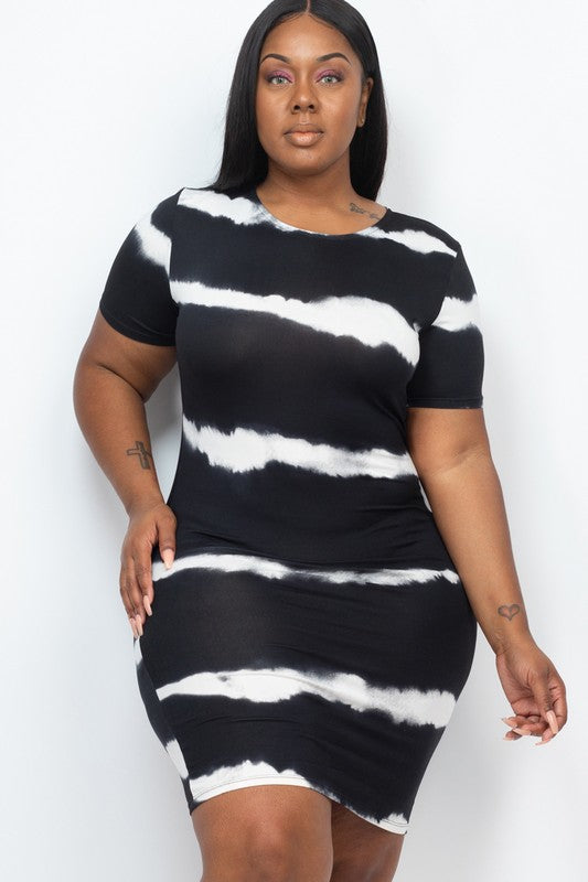 Woman wearing a stripe tie-dye midi dress with short sleeves and lace detail, styled against a white background