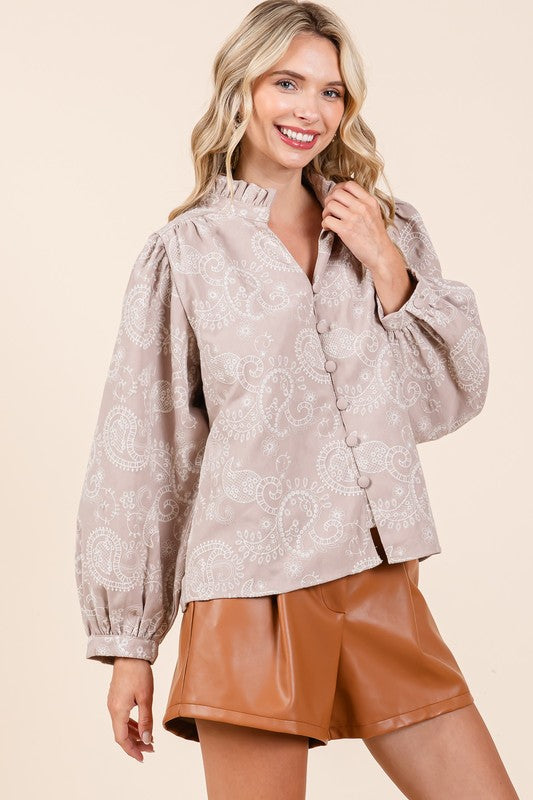 Feminine and detailed — eyelet lace, paisley print, and lace panels give this blouse romantic charm.