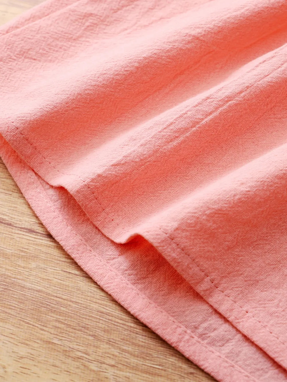 Baby girl pink dress with flutter sleeves, soft knit fabric, and delicate detailing — charming outfit for special occasions