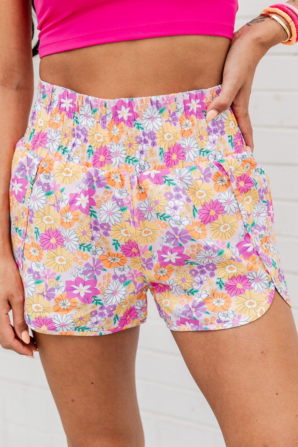 Floral, flirty, and free-spirited. These pink boho shorts are your go-to for warm-weather adventures, featuring a shirred high waist and a relaxed fit that flatters every curve. Whether you're headed to a beach day, brunch, or a music festival, these shorts bring effortless style and comfort.