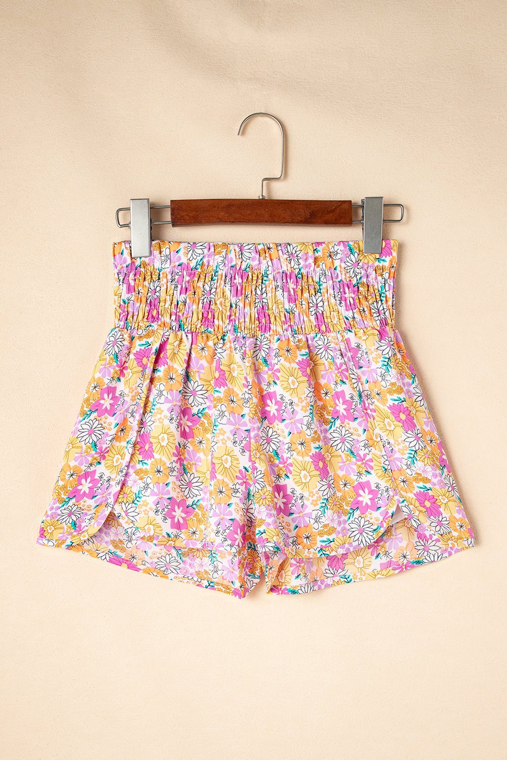Floral, flirty, and free-spirited. These pink boho shorts are your go-to for warm-weather adventures, featuring a shirred high waist and a relaxed fit that flatters every curve. Whether you're headed to a beach day, brunch, or a music festival, these shorts bring effortless style and comfort.