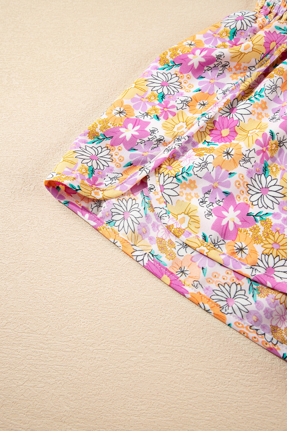 Floral, flirty, and free-spirited. These pink boho shorts are your go-to for warm-weather adventures, featuring a shirred high waist and a relaxed fit that flatters every curve. Whether you're headed to a beach day, brunch, or a music festival, these shorts bring effortless style and comfort.