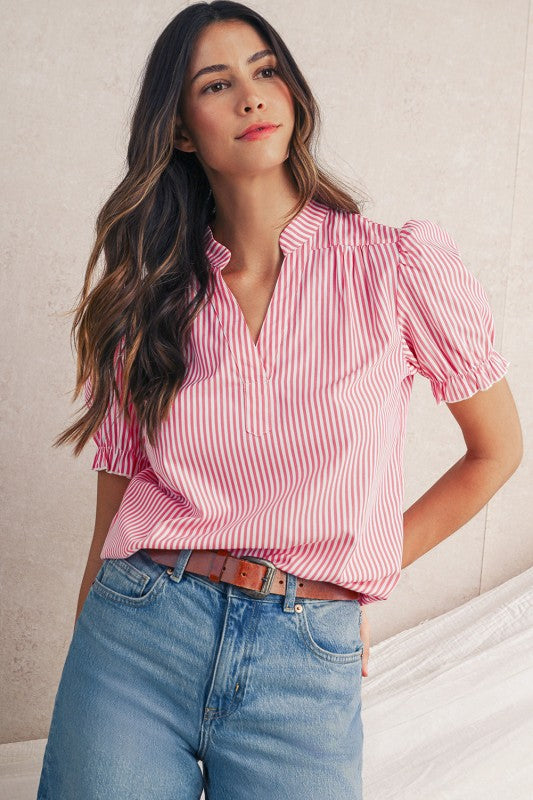 Bold pink stripe print adds fun and personality, perfect for casual or semi-dressy looks.