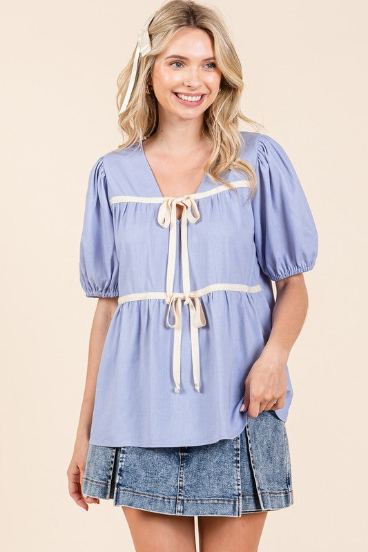 Piping draws the eye to its silhouette while maintaining an easy, laid-back feel.