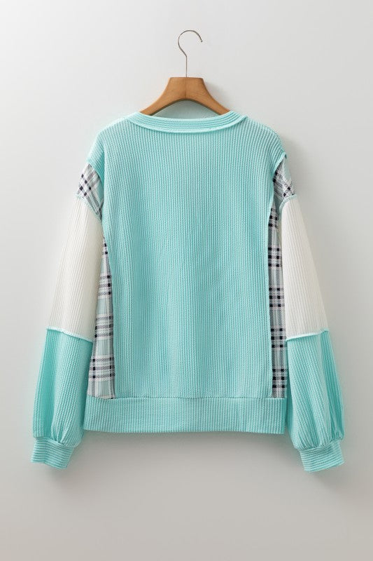 Split-neck opening adds a flattering, casual neckline.