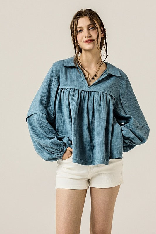 V-neckline adds a touch of elegance and openness.