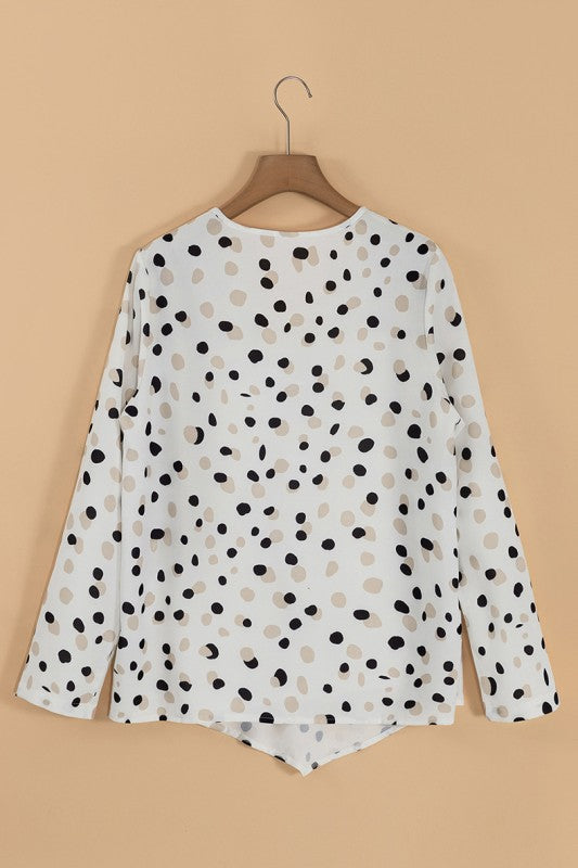 Polka dot print adds playful elegance.