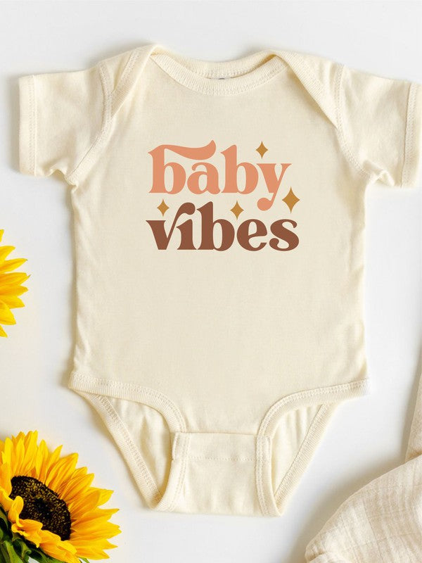 Baby onesie in vintage retro graphic print with snap leg closure and soft cotton knit fabric