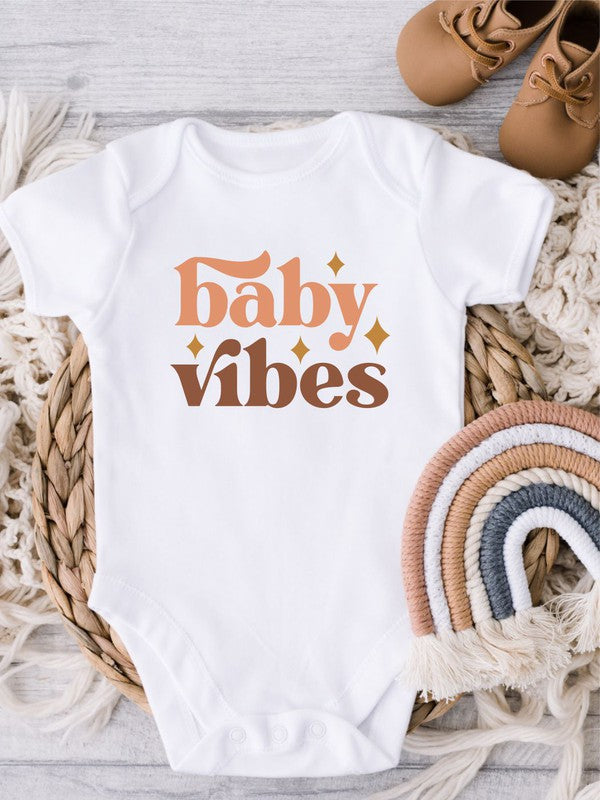 Baby onesie in vintage retro graphic print with snap leg closure and soft cotton knit fabric