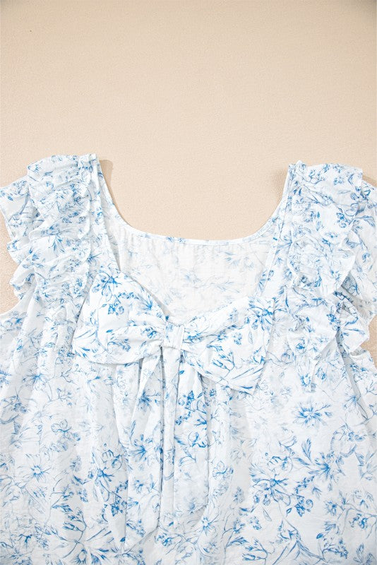 Gentle wash care helps preserve the delicate floral print and ribbon detailing. (care tip)