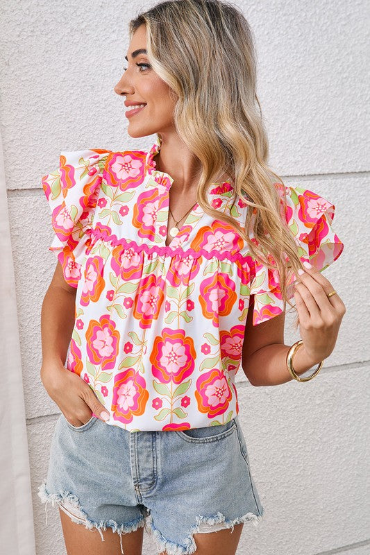 Ruffle sleeves add playful volume and a romantic silhouette.