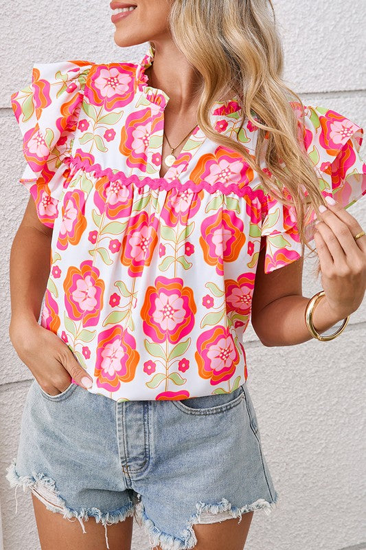 Made with 100% polyester in a soft rose hue — light and flowy.