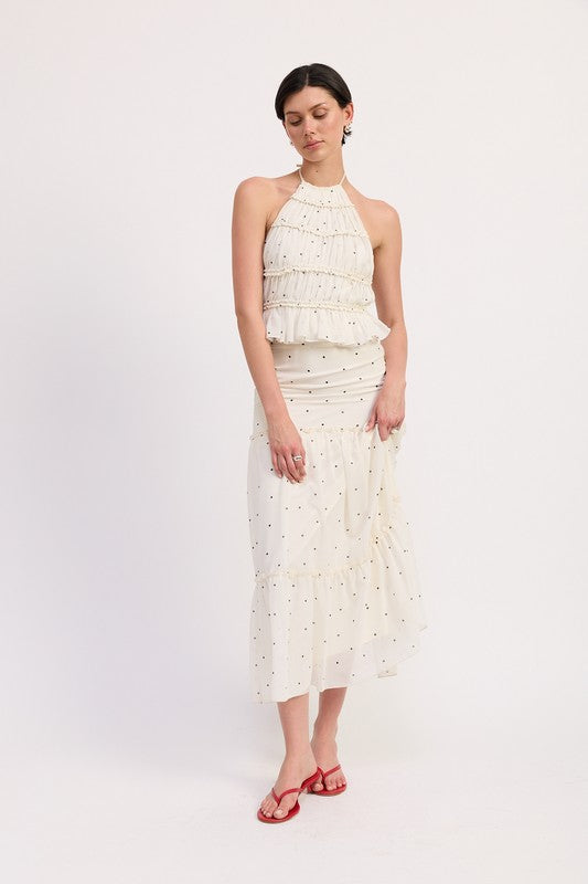 Gorgeous when paired with a neutral bottom, so the top becomes the focal point.