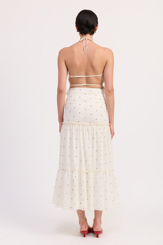 Adds texture and drama to any outfit with minimal layering.