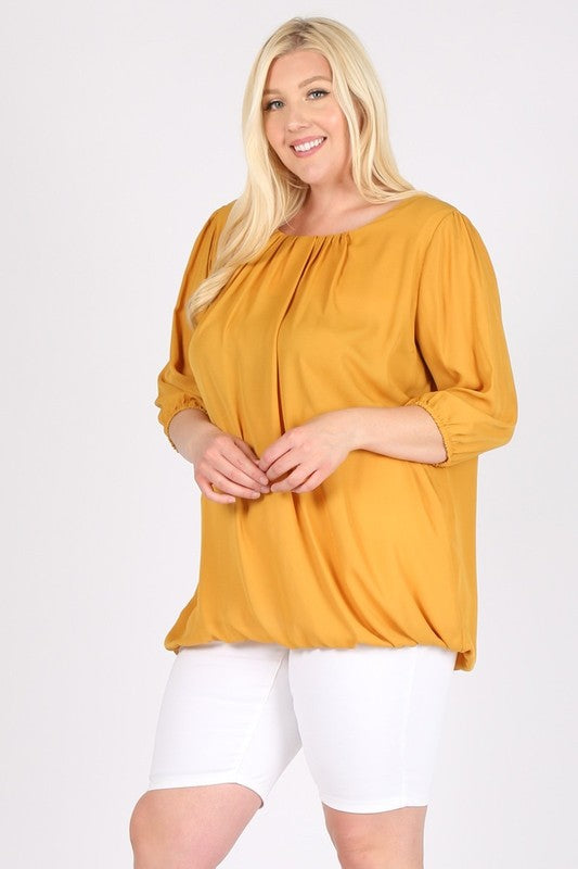 Hem hits just at or below hip for flattering coverage.