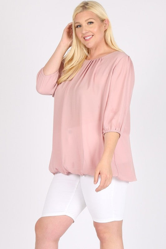 It can be tucked in or worn out, depending on style.
