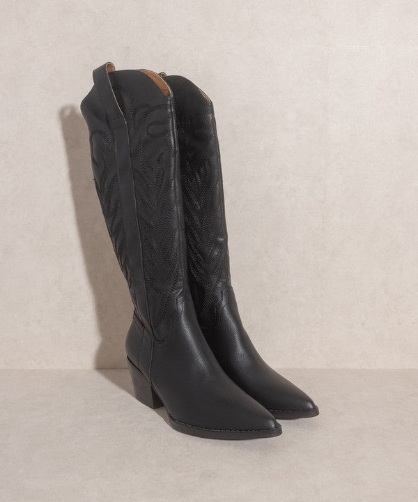 Knee-high western boots with embroidered stitching, pointed toe, stacked block heel, and side zipper closure.