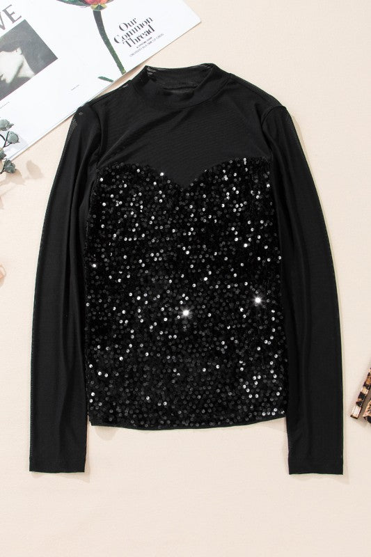 Flat lay of mock neck sequin mesh blouse on white background.