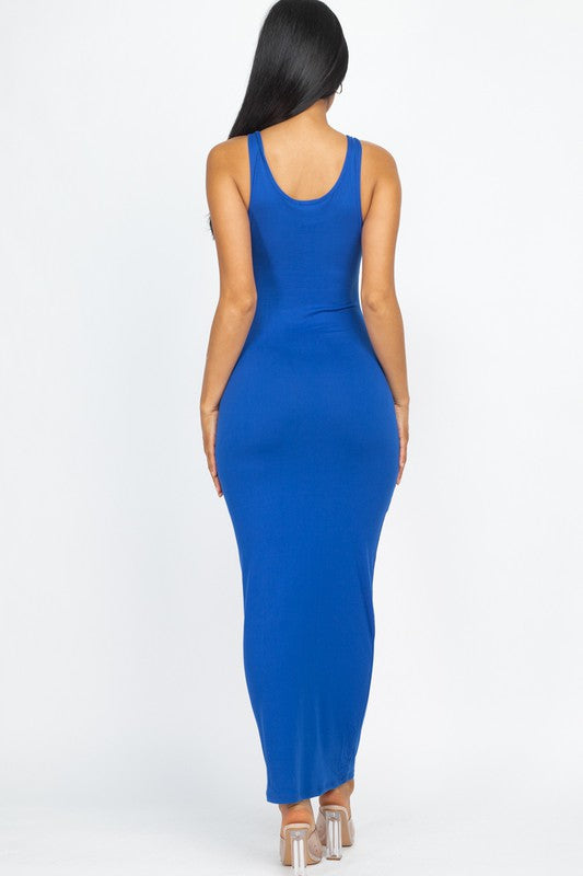 Back view of blue dress worn by a model