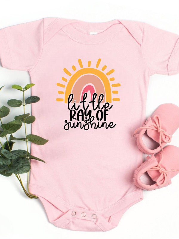 Baby girl onesie in soft cotton with “Sunshine” graphic, snap-leg closure