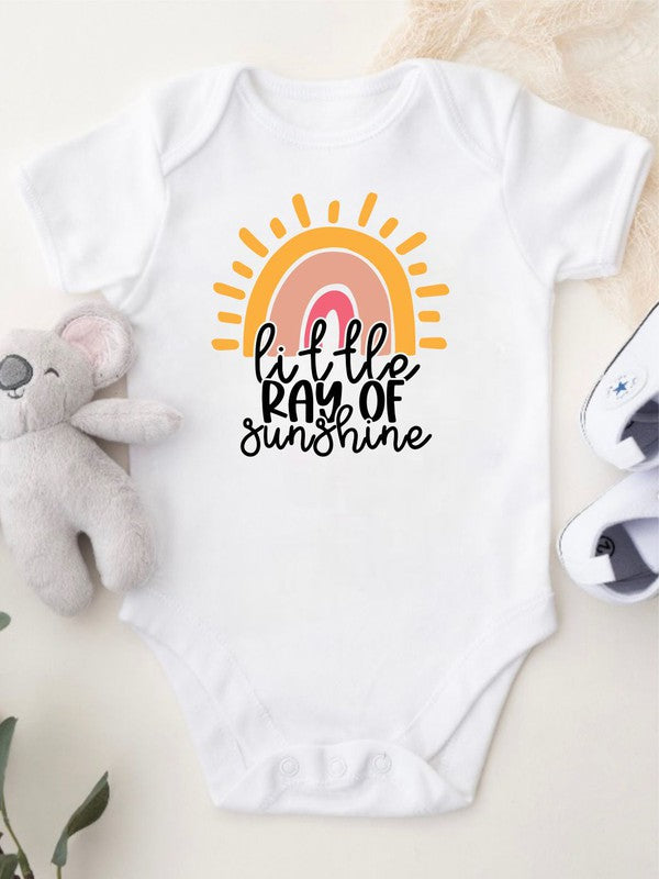 Baby girl onesie in soft cotton with “Sunshine” graphic, snap-leg closure