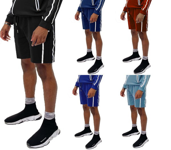 Elevate your everyday look with Taped Stripe Shorts—where comfort meets bold design. Featuring contrast side stripes that add a pop of energy, these shorts are perfect for workouts, hangouts, or laid-back weekends. Whether you're hitting the gym or the streets, they deliver effortless style and movement.