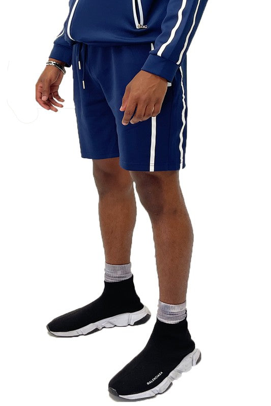 Elevate your everyday look with Taped Stripe Shorts—where comfort meets bold design. Featuring contrast side stripes that add a pop of energy, these shorts are perfect for workouts, hangouts, or laid-back weekends. Whether you're hitting the gym or the streets, they deliver effortless style and movement.