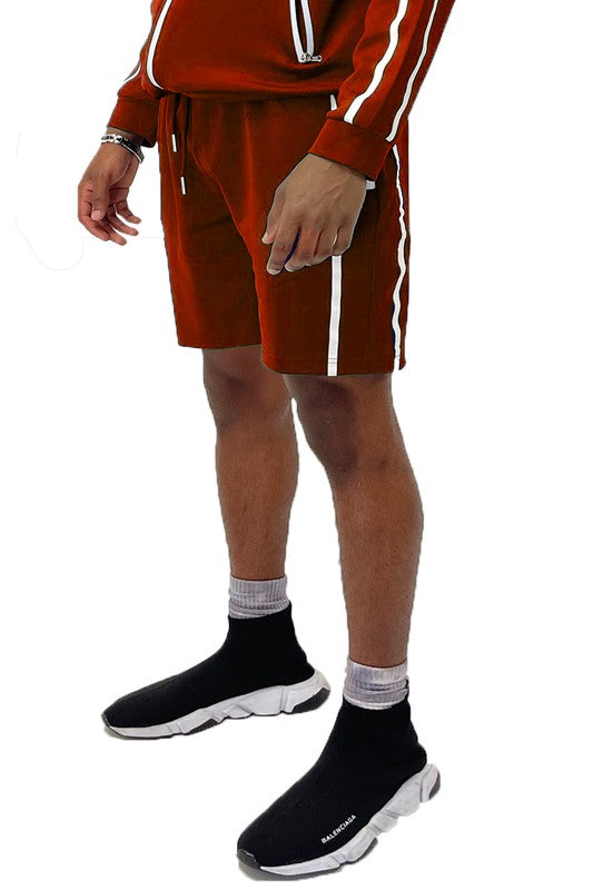 Elevate your everyday look with Taped Stripe Shorts—where comfort meets bold design. Featuring contrast side stripes that add a pop of energy, these shorts are perfect for workouts, hangouts, or laid-back weekends. Whether you're hitting the gym or the streets, they deliver effortless style and movement.