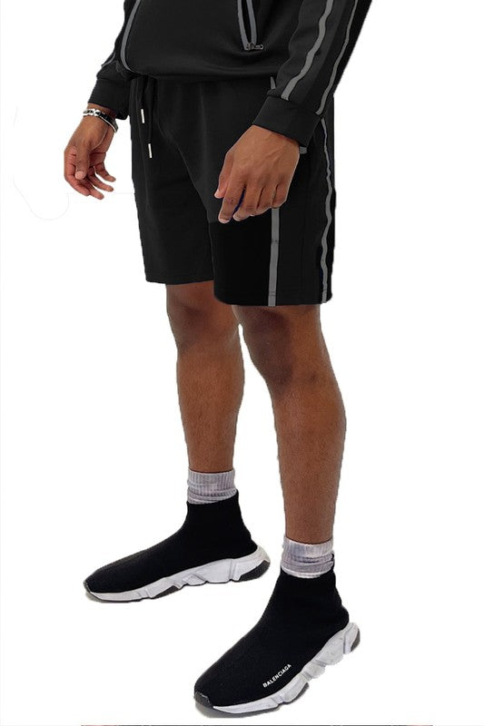 Elevate your everyday look with Taped Stripe Shorts—where comfort meets bold design. Featuring contrast side stripes that add a pop of energy, these shorts are perfect for workouts, hangouts, or laid-back weekends. Whether you're hitting the gym or the streets, they deliver effortless style and movement.