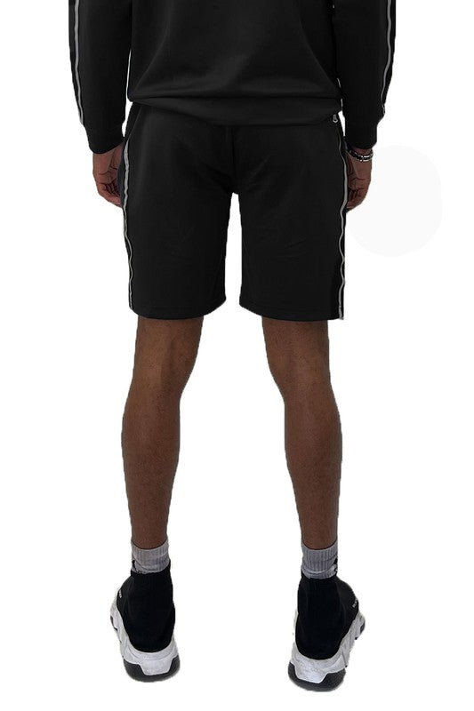 Elevate your everyday look with Taped Stripe Shorts—where comfort meets bold design. Featuring contrast side stripes that add a pop of energy, these shorts are perfect for workouts, hangouts, or laid-back weekends. Whether you're hitting the gym or the streets, they deliver effortless style and movement.
