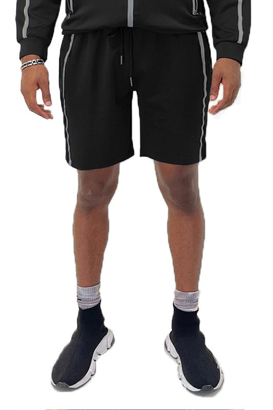 Elevate your everyday look with Taped Stripe Shorts—where comfort meets bold design. Featuring contrast side stripes that add a pop of energy, these shorts are perfect for workouts, hangouts, or laid-back weekends. Whether you're hitting the gym or the streets, they deliver effortless style and movement.