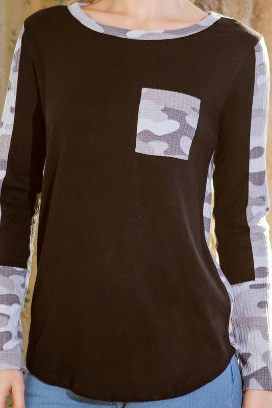A standout sweater that pairs camouflage texture and contrasting structure.