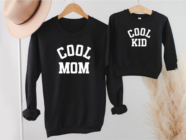 Black toddler sweatshirt in soft fleece with crew neck and long sleeves — comfortable everyday top for toddlers