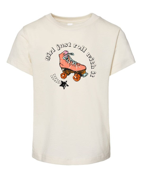Beige t-shirt with a pink roller skate graphic and text on a white background