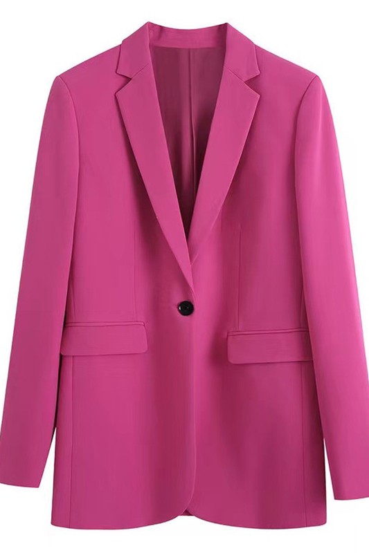 This image shows a pink suit hanging beautifully.
