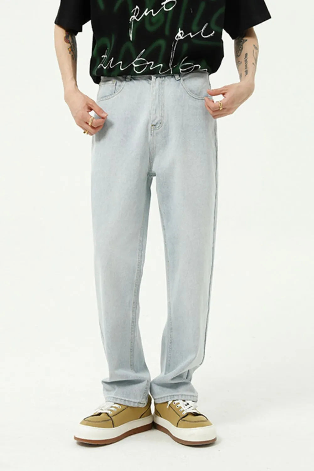 Classic silhouette. Modern edge. These jeans combine the timeless appeal of a straight leg with the sleekness of a slim fit—finished in a washed tone that adds character to every step.